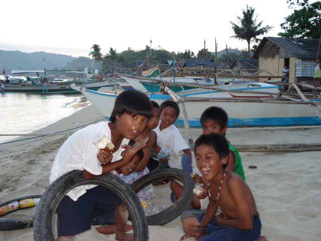 Who needs Nintendo when you have a couple tires and a few tin cans?