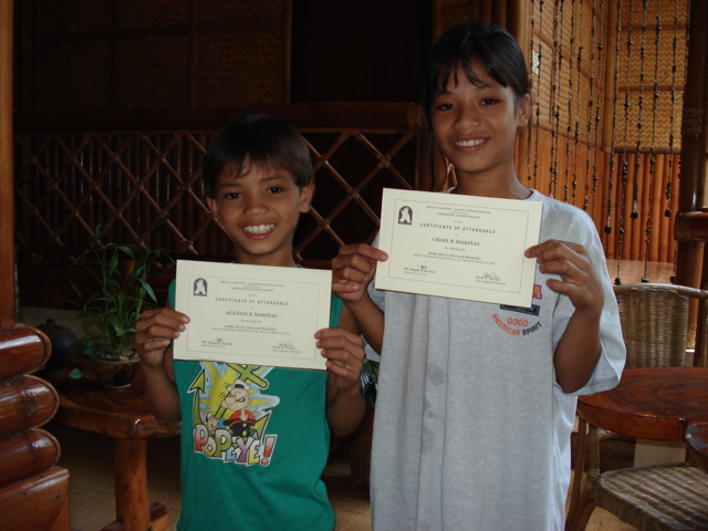 Crysle and Agustin graduate from Sign Language workshop