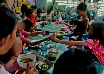 Feeding Hope Amid the Storm: Rose CGI and Philippine Red Cross Continue Feeding Program in Barangay Manocmanoc