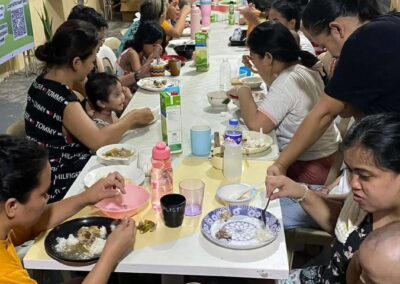 Children and families at Bahay Aruga receiving support from Rose CGI
